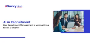 Recruitment management professionals using AI-powered HRMS software for faster hiring decisions during a team interview meeting