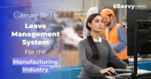 Manufacturing HR professional selects top leave management system on screen with Savvy HRMS branding for shift-based factories.