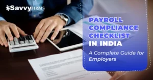 Payroll compliance checklist in India showing HR professional calculating salaries and statutory deductions.